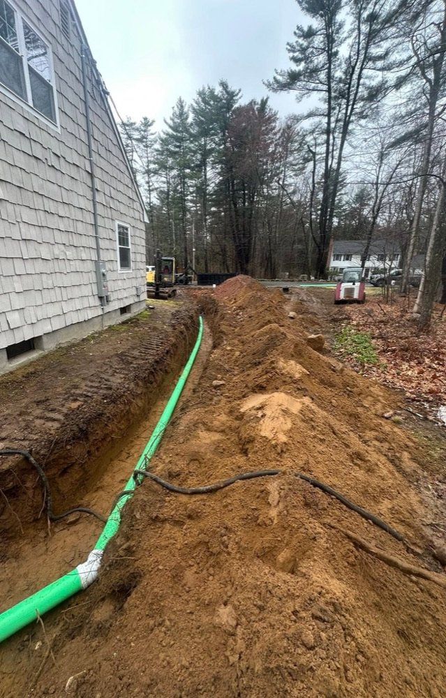 Water line trench excavation near foundation